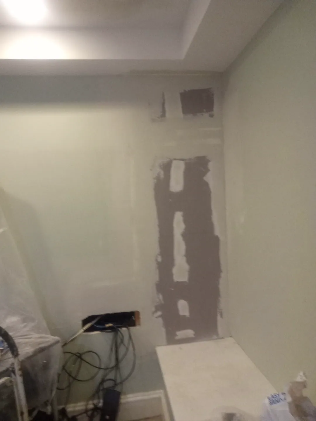 The new drywall taped and mudded